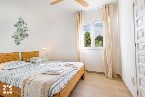 Postel nebo postele na pokoji v ubytování Villa Thalassa by Abahana Villas
