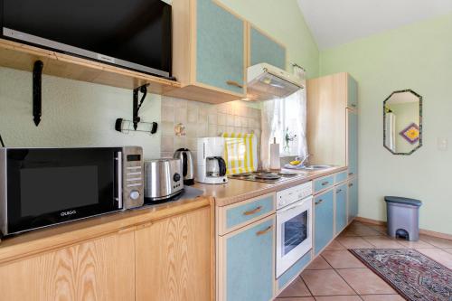 Η κουζίνα ή μικρή κουζίνα στο Apartment Eulenhof 1