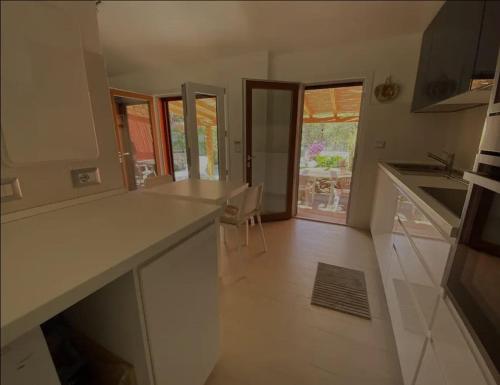 Η κουζίνα ή μικρή κουζίνα στο Hotel Porto Puddu - Il Nido dei Gabbiani