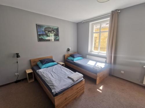 Katil atau katil-katil dalam bilik di Bemma City Rooms