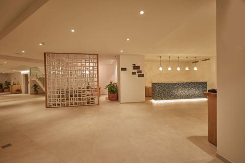 The lobby or reception area at The Club Cala San Miguel Hotel Ibiza, Curio Collection by Hilton, Adults only