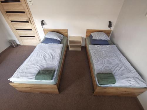 Katil atau katil-katil dalam bilik di Bemma City Rooms