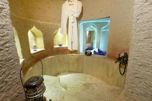 a statue of a statue of a god in a room at Hu of Cappadocia - Special Class in Uchisar