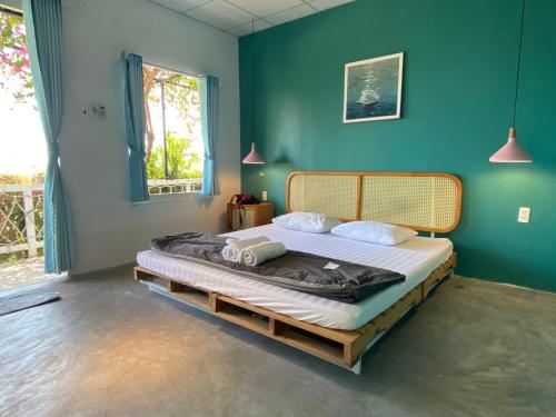 Voodi või voodid majutusasutuse Kaktus home & kafe toas