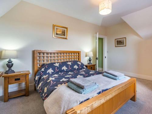 Llit o llits en una habitació de 4 bed property in Hastings 85519