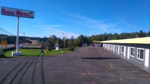 an empty street in front of a gas station at Oasis Motel in Antigonish