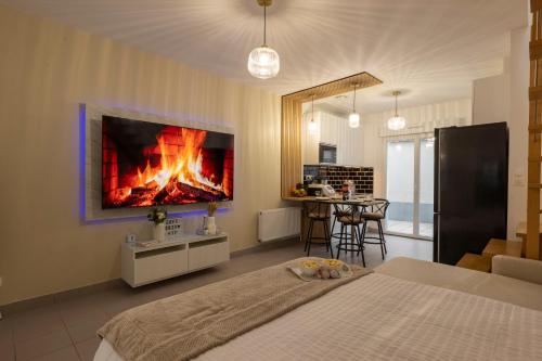 a bedroom with a bed with a fire on the wall at --OFFRE SPECIALE-- LOFT COZY 77 --NEW--Jaccuzi CONFORT Terrasse Parking Wifi - 3 CH et 2 SDB - Aéroport CDG - Disneyland Paris in Annet-sur-Marne