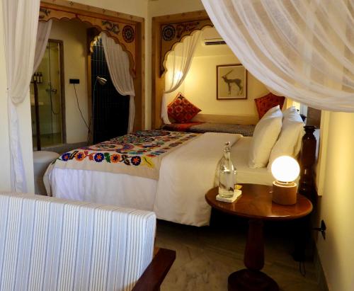 Ένα ή περισσότερα κρεβάτια σε δωμάτιο στο The Stepwell Hotel
