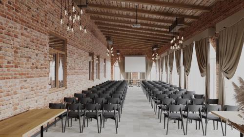 an empty room with chairs and a projection screen at Готель Бережани in Brzezhany