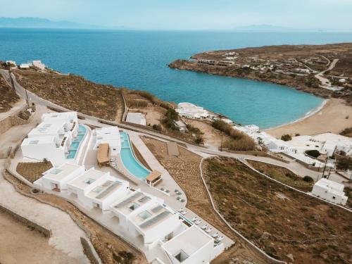 an aerial view of a resort next to a beach at Mykonos Flow - Super Paradise in Super Paradise Beach