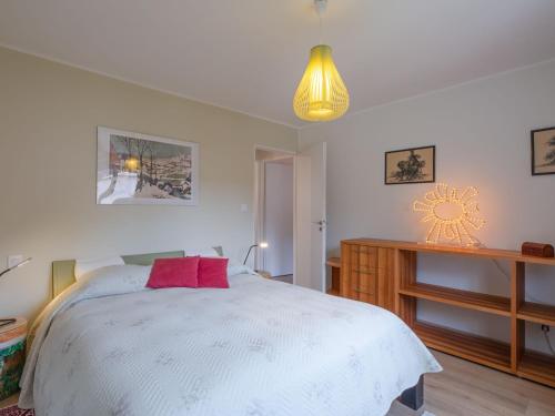 Ένα ή περισσότερα κρεβάτια σε δωμάτιο στο Holiday Home L'Ecrin by Interhome