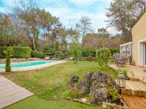 Κήπος έξω από το Holiday Home L'Ecrin by Interhome