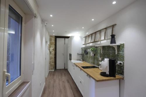 Dapur atau dapur kecil di Tammurriata Nera Bedroom