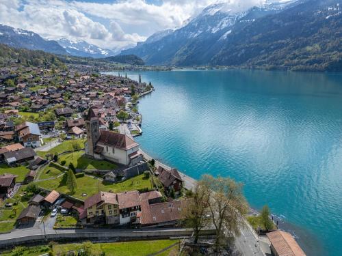 an aerial view of a town next to a lake at StayBrienz - Lake Brienz Holiday Apartment in Brienz