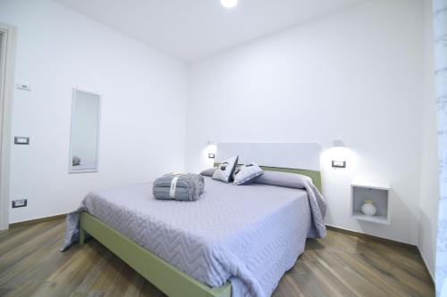 Ένα ή περισσότερα κρεβάτια σε δωμάτιο στο Pina's house