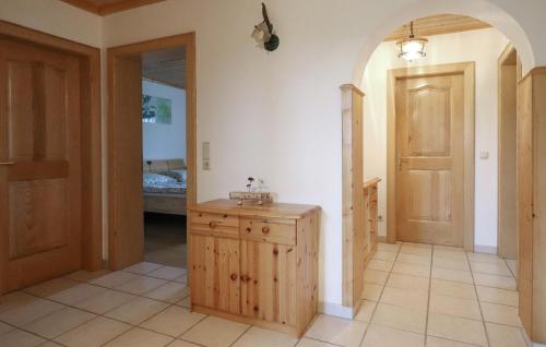 a room with a wooden cabinet and an open door at Amazing Home In Puchbeihallein With Wifi in Puch bei Hallein