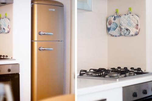 Η κουζίνα ή μικρή κουζίνα στο Orosei Home Holidays - I fiori