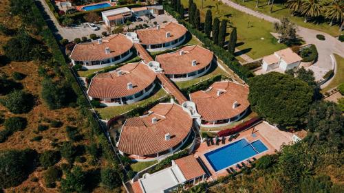 an overhead view of a row of houses at Lagos Appartement Resort in Lagos