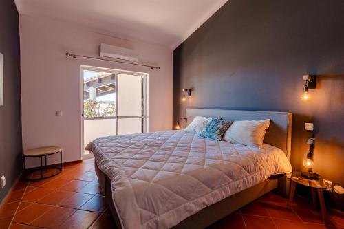 Llit o llits en una habitació de Lagos Appartement Resort