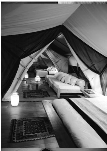 a black and white photo of a tent at Noé Nomade in Sidi Bou Othmane
