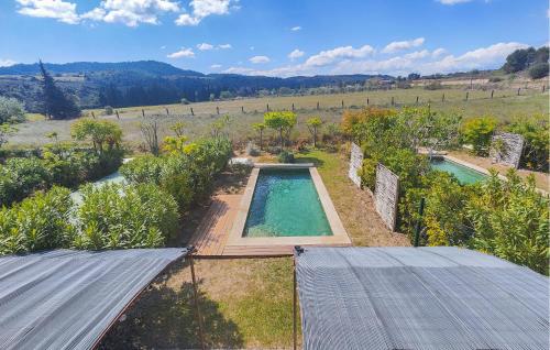 an overhead view of a swimming pool in a garden at Stunning Home In Saint-Laurent-De-La-Ca in Saint-Laurent-de-la-Cabrerisse