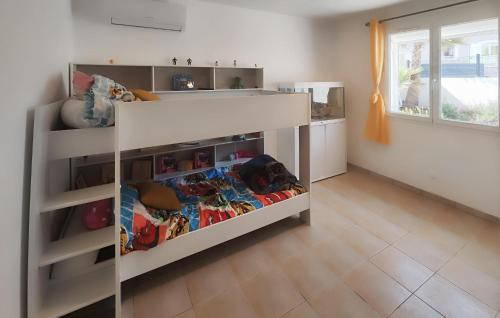 a bedroom with a bunk bed in a room at Lovely Home In Villespassans With Wifi in Villespassans