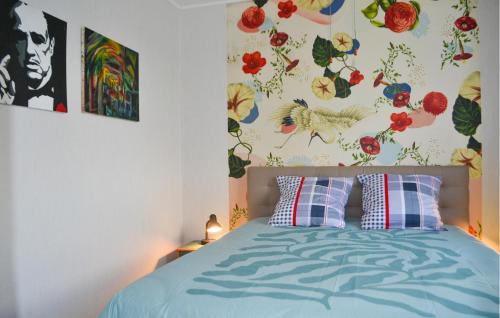 A bed or beds in a room at Nice Home In Marcillac-la-croisille With Wi-fi