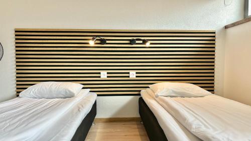 Katil atau katil-katil dalam bilik di Filosoofi 1 Studio Apartments