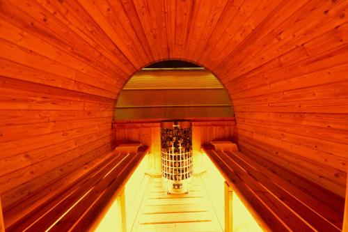 a small sauna with a light in the middle at Hotel Vanilla Komaki (Adult Only) in Komaki