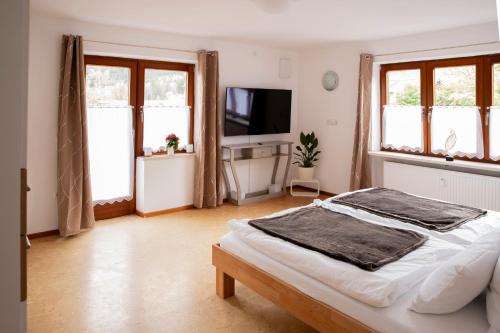 Katil atau katil-katil dalam bilik di Ferienwohnung zum Kunstei