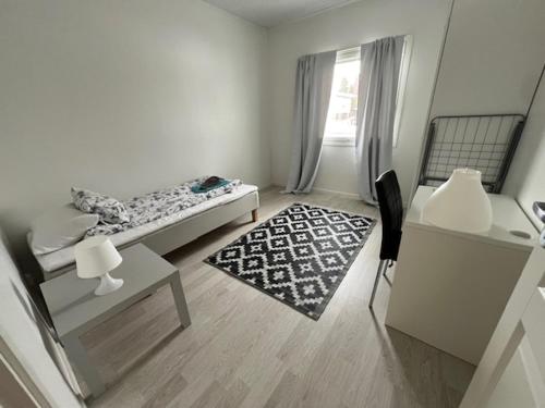 Zona d'estar a Apartment Kuokkamaantie, Pyhäjoki