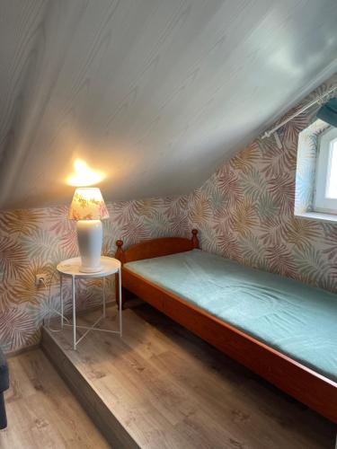 Postel nebo postele na pokoji v ubytování Pokoje Gościnne - Apartamenty MATI