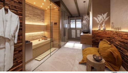 a room with a sauna with wooden walls at Hoimat Pfronten - Luxusappartements mit Sauna und Bergblick in Pfronten
