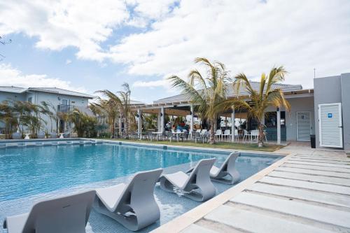 Piscina en o cerca de Residences by Playa Caracol Residences