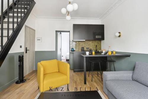 a living room with a yellow chair and a kitchen at KAZA BELLA - Maisons Alfort 3 Modern flat in Maisons-Alfort