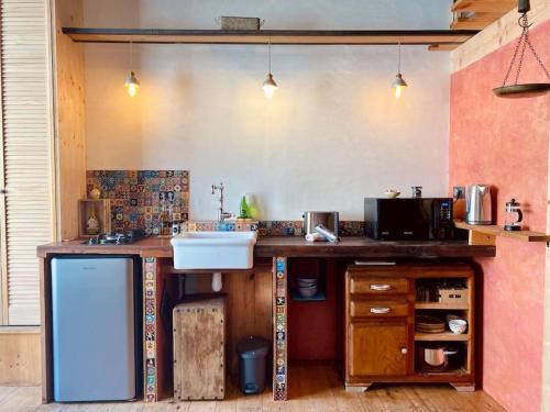 Nhà bếp/bếp nhỏ tại L'Atelier- Loft d'Artiste Aménagé, centre-ville