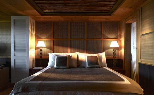 Una cama o camas en una habitación de LeCrans