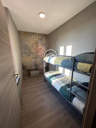Postel nebo postele na pokoji v ubytování Corte Grande Apartment
