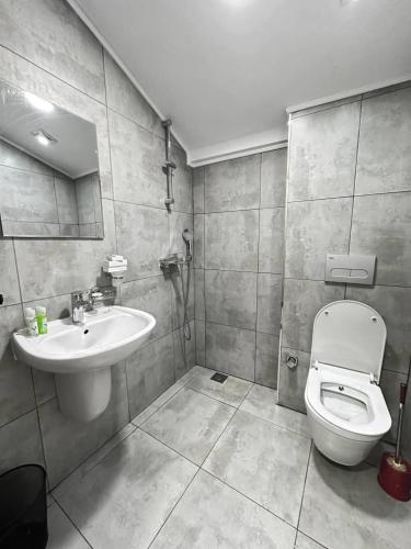 A bathroom at acacus hotel