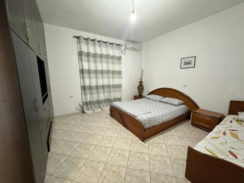 Ένα ή περισσότερα κρεβάτια σε δωμάτιο στο Guest House Drizaj