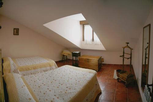 Posteľ alebo postele v izbe v ubytovaní Casa El Artesano