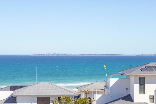 a view of the ocean from a beach at Sea Breeze in Bloubergstrand