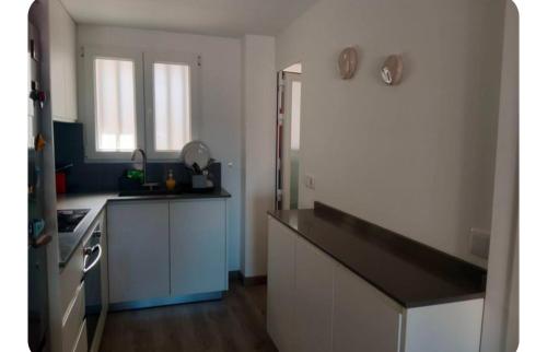 Kuchyň nebo kuchyňský kout v ubytování Apart Playa Bellreguard 1 habitación