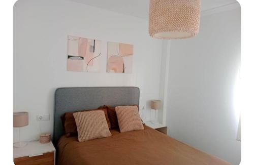 Postel nebo postele na pokoji v ubytování Apart Playa Bellreguard 1 habitación