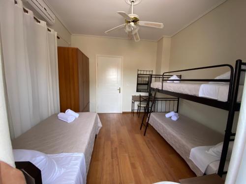 Postel nebo postele na pokoji v ubytování Pegasus Rooms