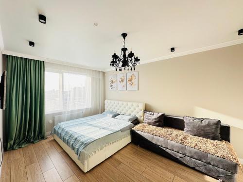 Кровать или кровати в номере MoD. Standard