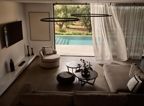 Πισίνα στο ή κοντά στο Oresteia Presidential Villa, a Legendary Retreat, By ThinkVilla