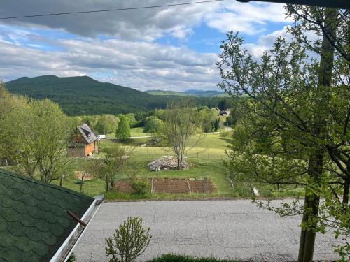 a view of a farm from the roof of a house at Guest House Štefanija in Poljanak