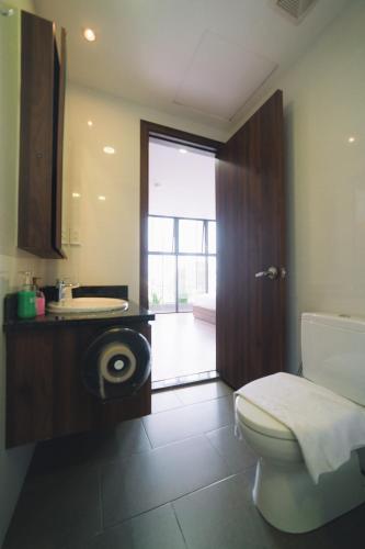 Katil atau katil-katil dalam bilik di Dalat Center Residence
