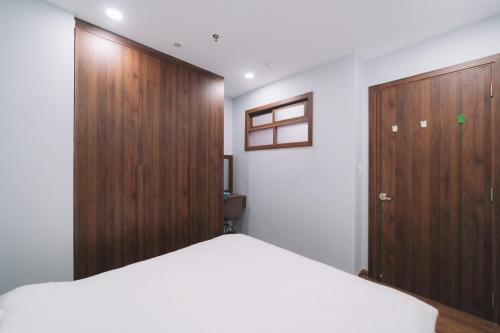 Katil atau katil-katil dalam bilik di Dalat Center Residence